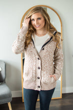 Load image into Gallery viewer, Model showing pocket detail on hooded sweater cardigan.
